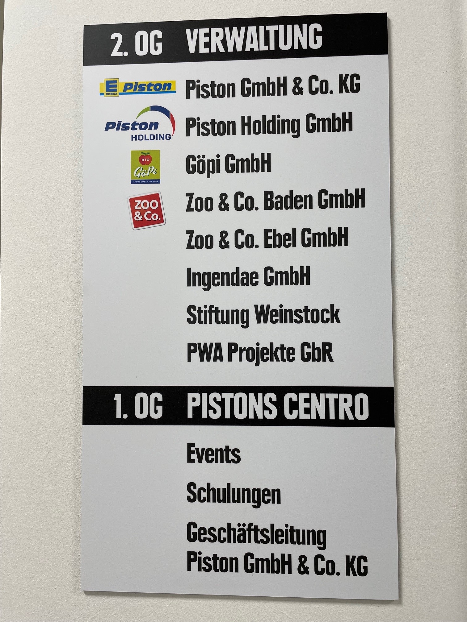 Piston - Firmenschild im Centro in Palmbach